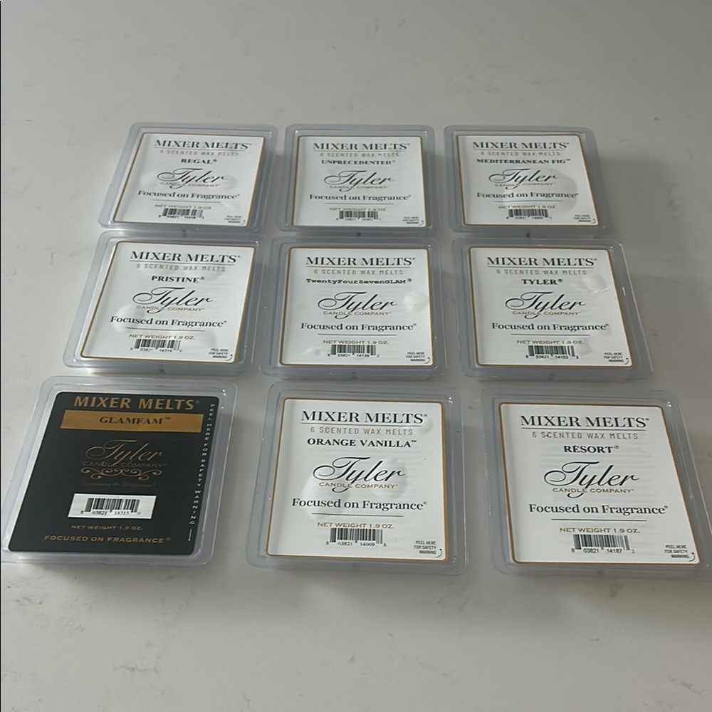 9 tyler wax melts 7 new, 1 has one square missing and another 2 missing.